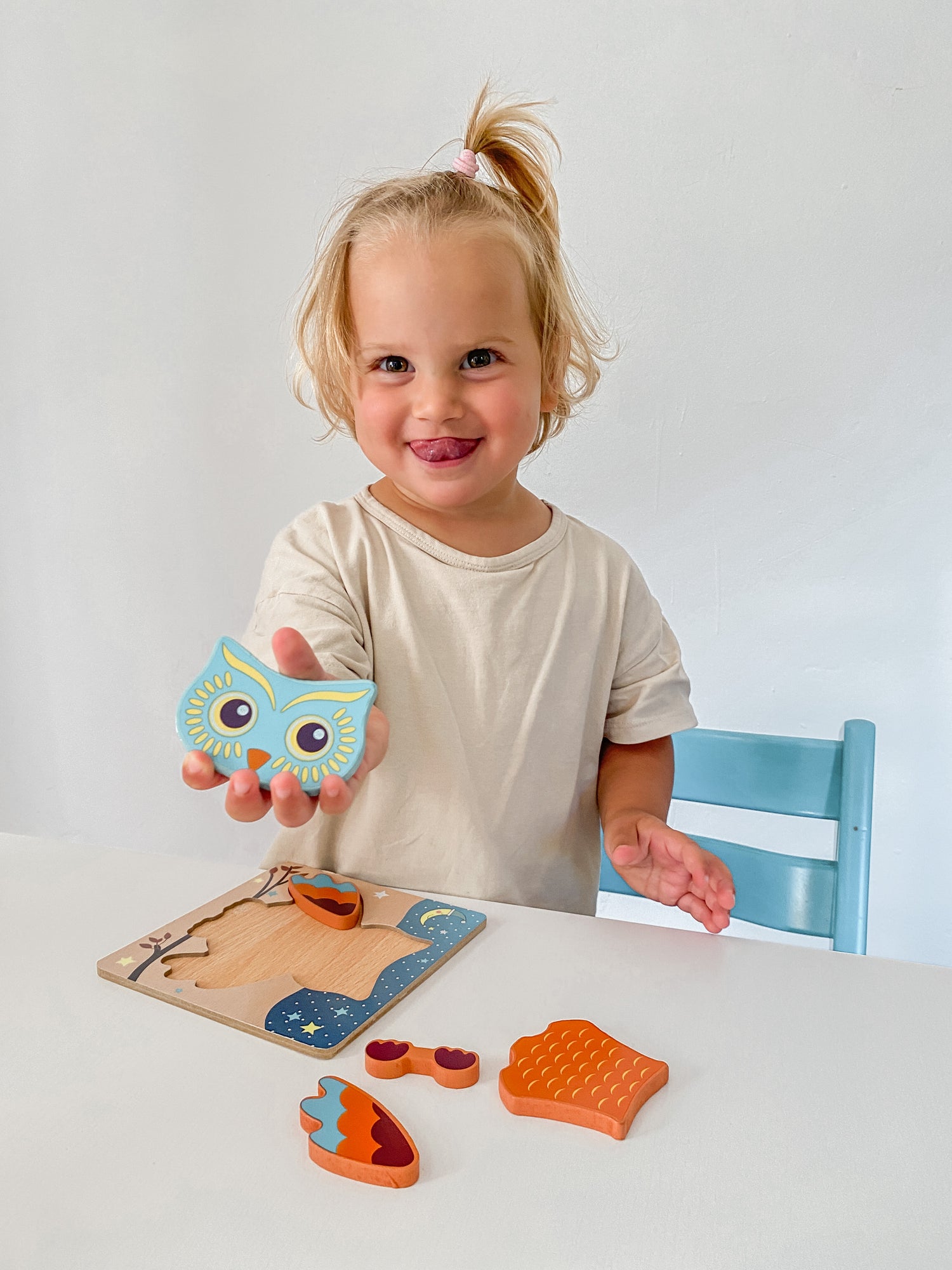 child playing with montessori toy